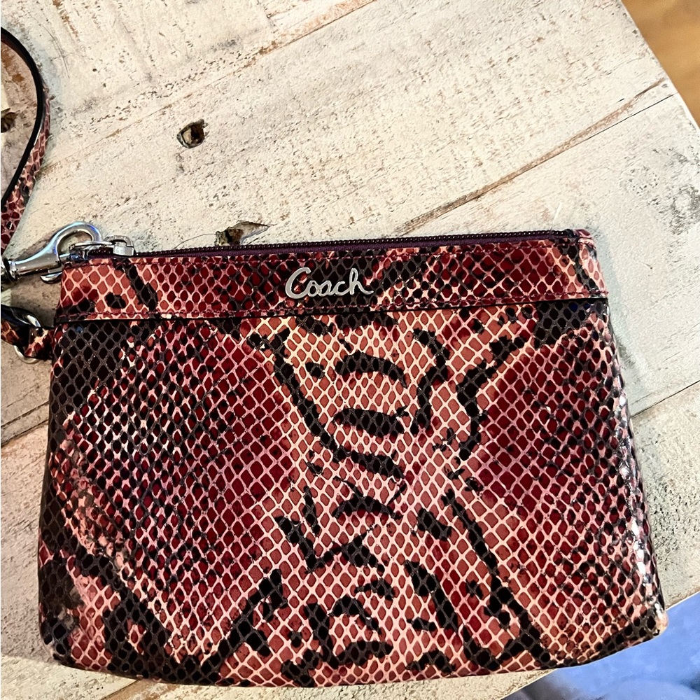 Coach snakeskin wristlet. Excellent condition